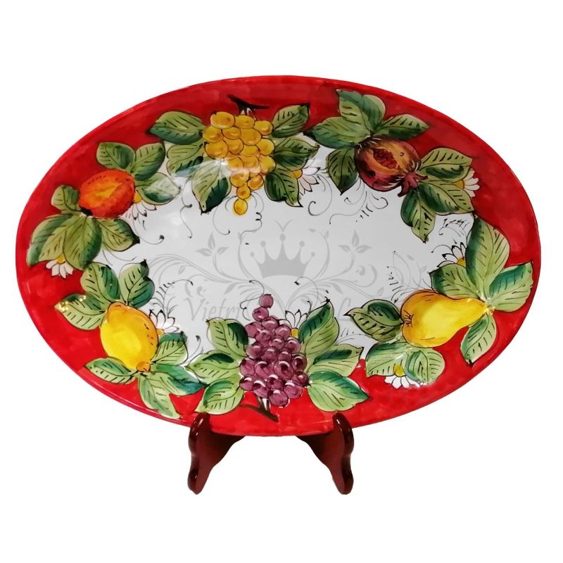 Línea ovalada suave de Fruttina. Platos para servir en cerámica Vietri.