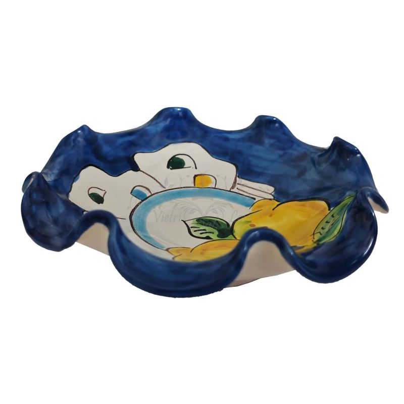 Scalloped bowl. Houses and Lemons line....