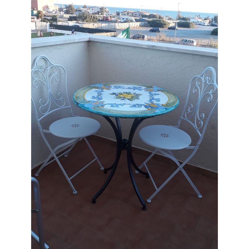 Table en pierre de lave émaillée. Baroque....