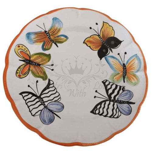 Plato con temática de mariposas. Cerámica de Vietri....