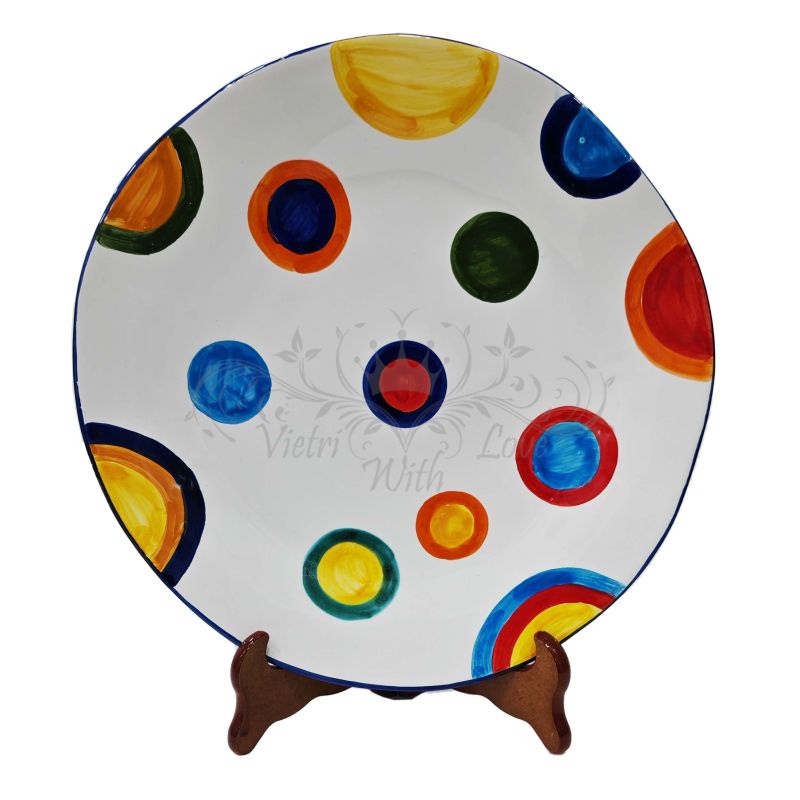 Piatto. Forma irregolare Linea Pois. Dipinto a...