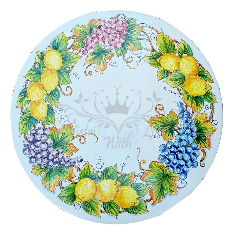 Table. Ceramic-coated lava stone table. Lemons...