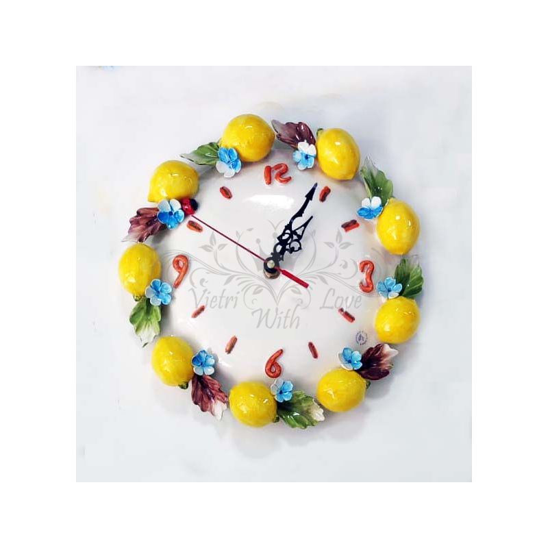 Horloge murale. Citrons en relief. Céramique de...