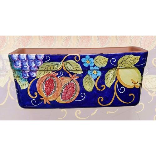 Jardinera rectangular. Fondo azul con granadas, flores y limones. Cerámica de Vietri. Pintada a mano.