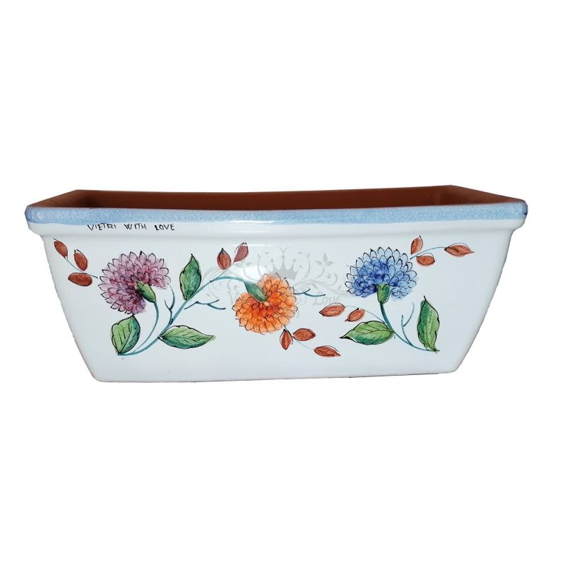 Rectangular Planter. White Base with Flowers....