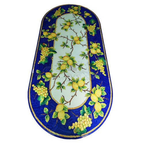 Table en pierre de lave émaillée. citrons et raisins. bord bleu. Peinte à la main. Céramique de Vietri.