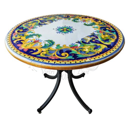 Mesa de piedra volcánica esmaltada. Flores y barrocas....