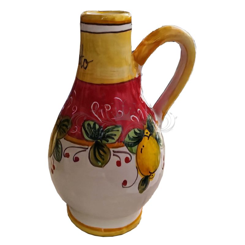 Oil & vinegar cruet bottle with handle. Lemon...