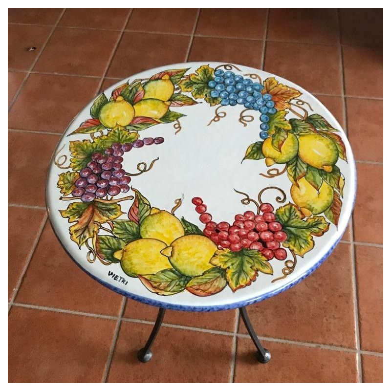 Table. Ceramic-coated lava stone table. Grapes...