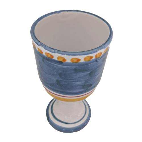 Pinceladas de línea de copa fondo azul. Cerámica Vietri.