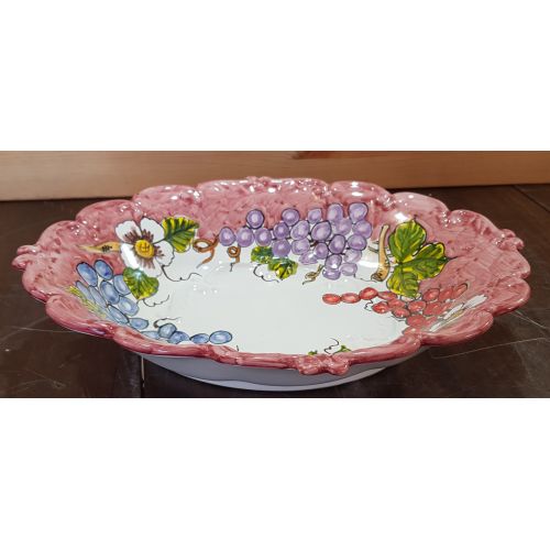 Centrotavola ovale bordo ondulato rosso vecchio, decoro frutta. Ceramica di Vietri