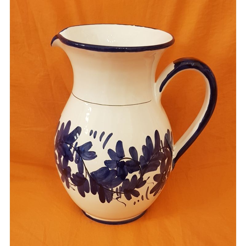 Pitcher white  Background blue. handpainted...