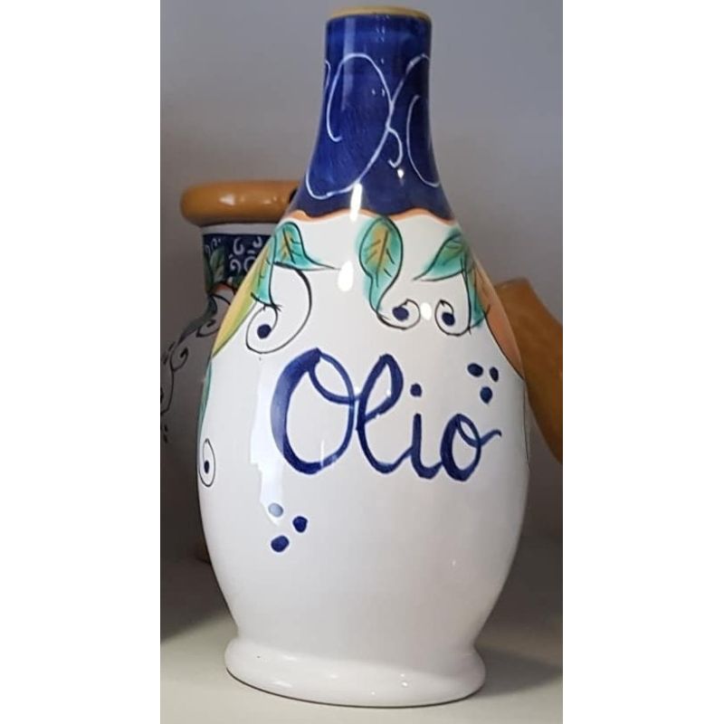 Oil bottle white  Background blue. handpainted Vietri ceramic