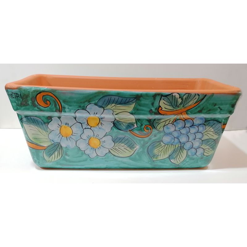 Rechteckiger Pflanzkasten. Grüner Ramina-Grund...