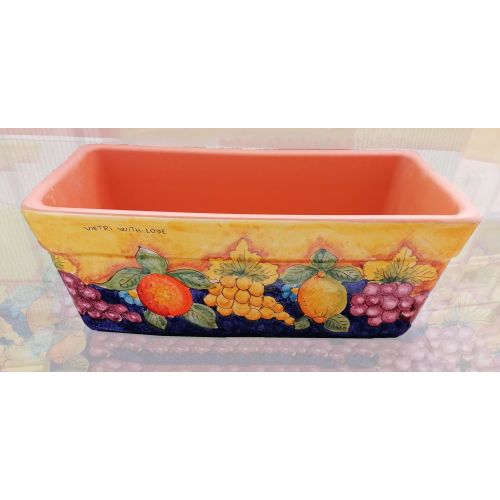 Jardinera rectangular. Fondo amarillo con frutas y limones. Cerámica de Vietri. Pintada a mano.