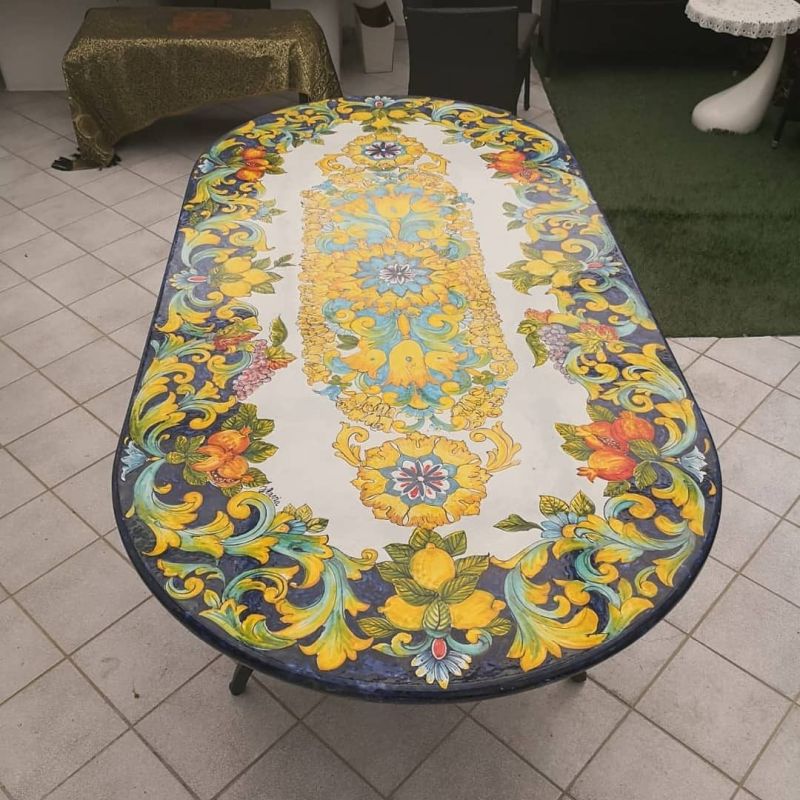 Table. Ceramic-coated lava stone table....