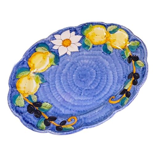 Oval scalloped serving plate. Lemons & olives line....