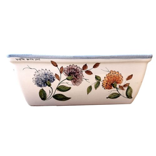 Jardinière rectangulaire. Fond blanc avec fleurs....