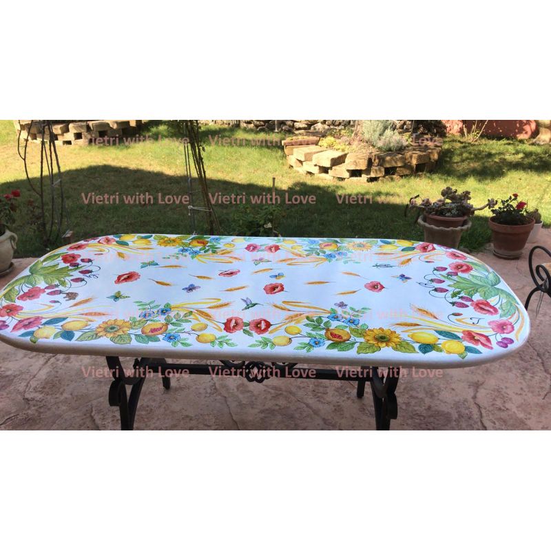 Ceramicized lava stone table. Hand painted flowers and strawberries. Vietri ceramics