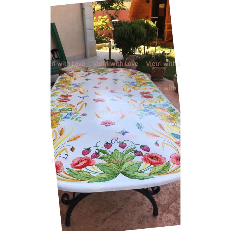 Table. Ceramic-coated lava stone table. Flowers...