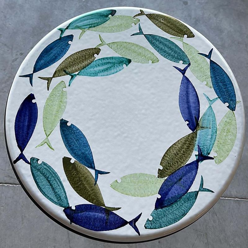 Table en pierre de lave émaillée. Poissons...