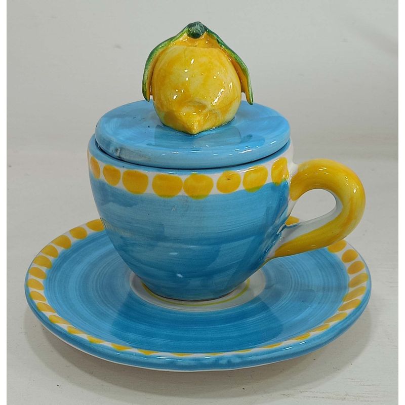 Coffee cup with embossed lid, saucer animal...